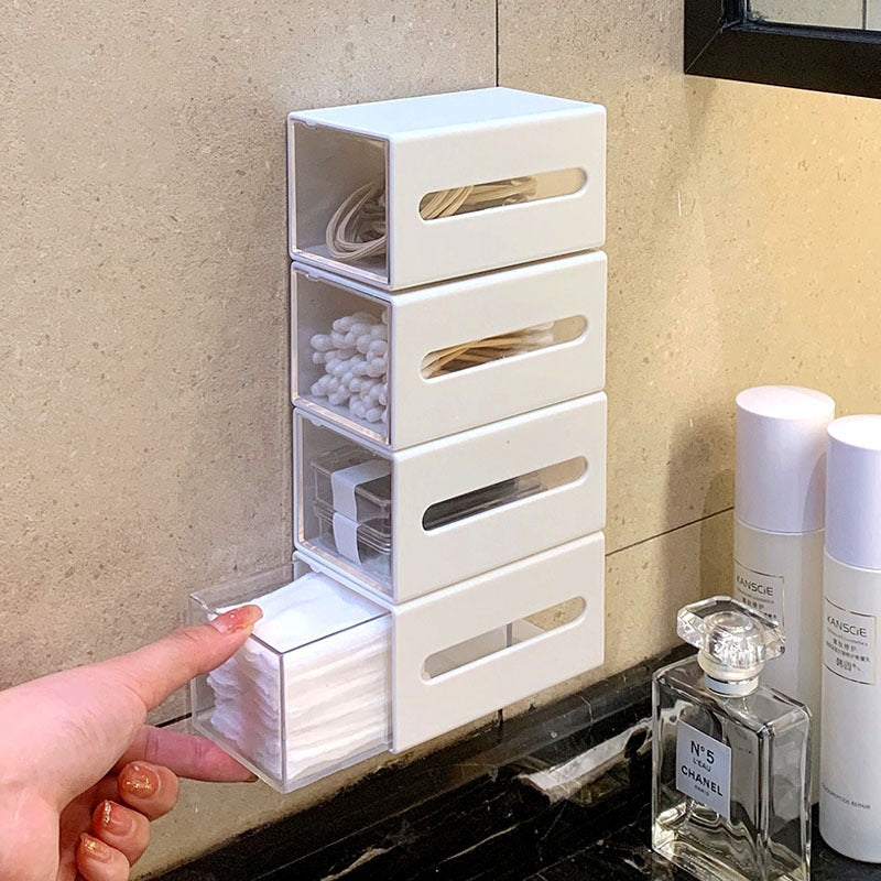 Cotton swab drawer on a bathroom wall
